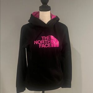 The North Face Black Hoodie with Vibrant Pink Logo